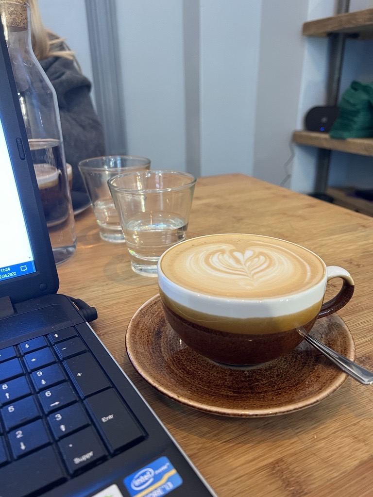 Enjoying coffee whilst studying at Arcade